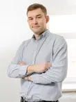 Андрей Холуев